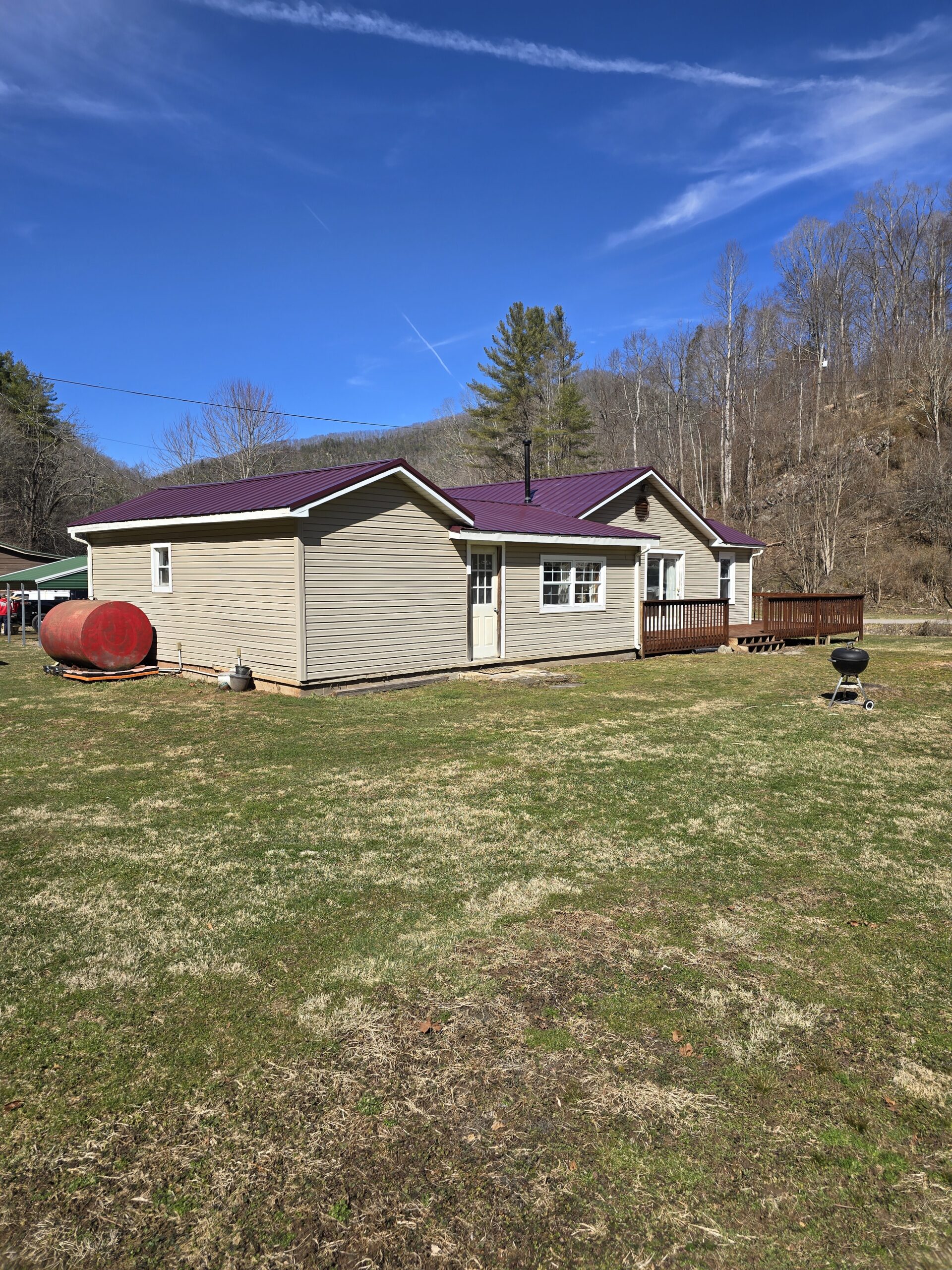 Metal roofing on a multi-section home